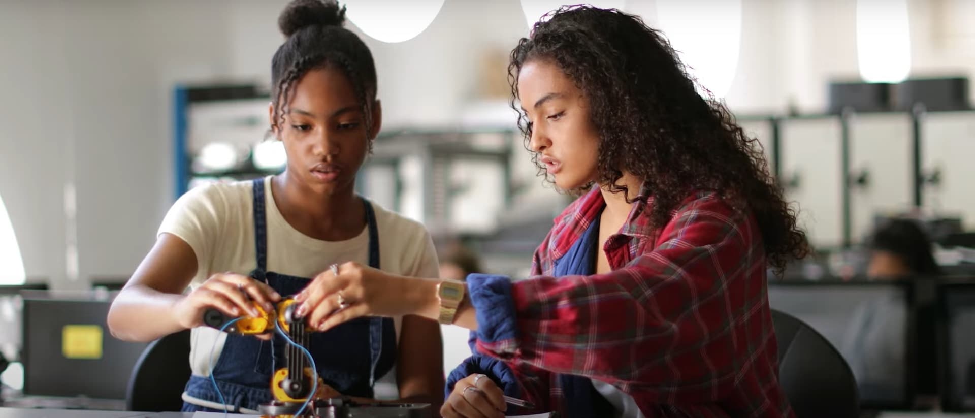 Students and coaches using the STEM Code platform